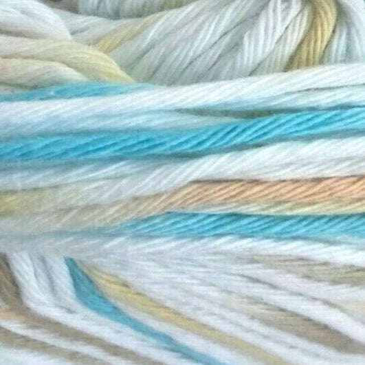 Close-up of multicolored yarn with shades of blue, beige, and white.