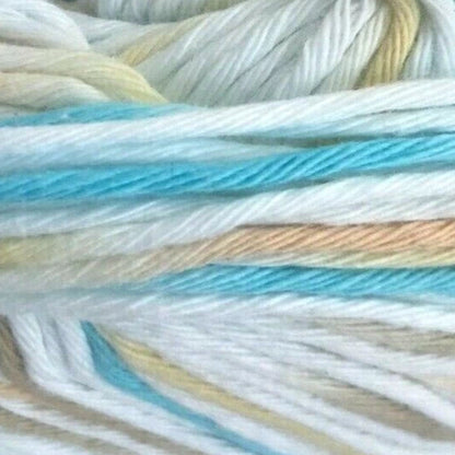 Close-up of multicolored yarn with shades of blue, beige, and white.