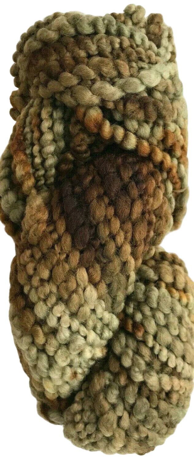 Knitted yarn skein in green and brown tones on a white background