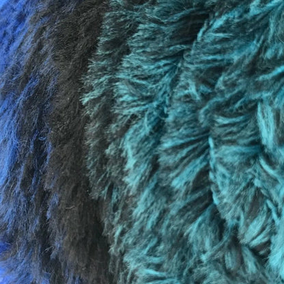 Close-up of a blue and green textured fabric
