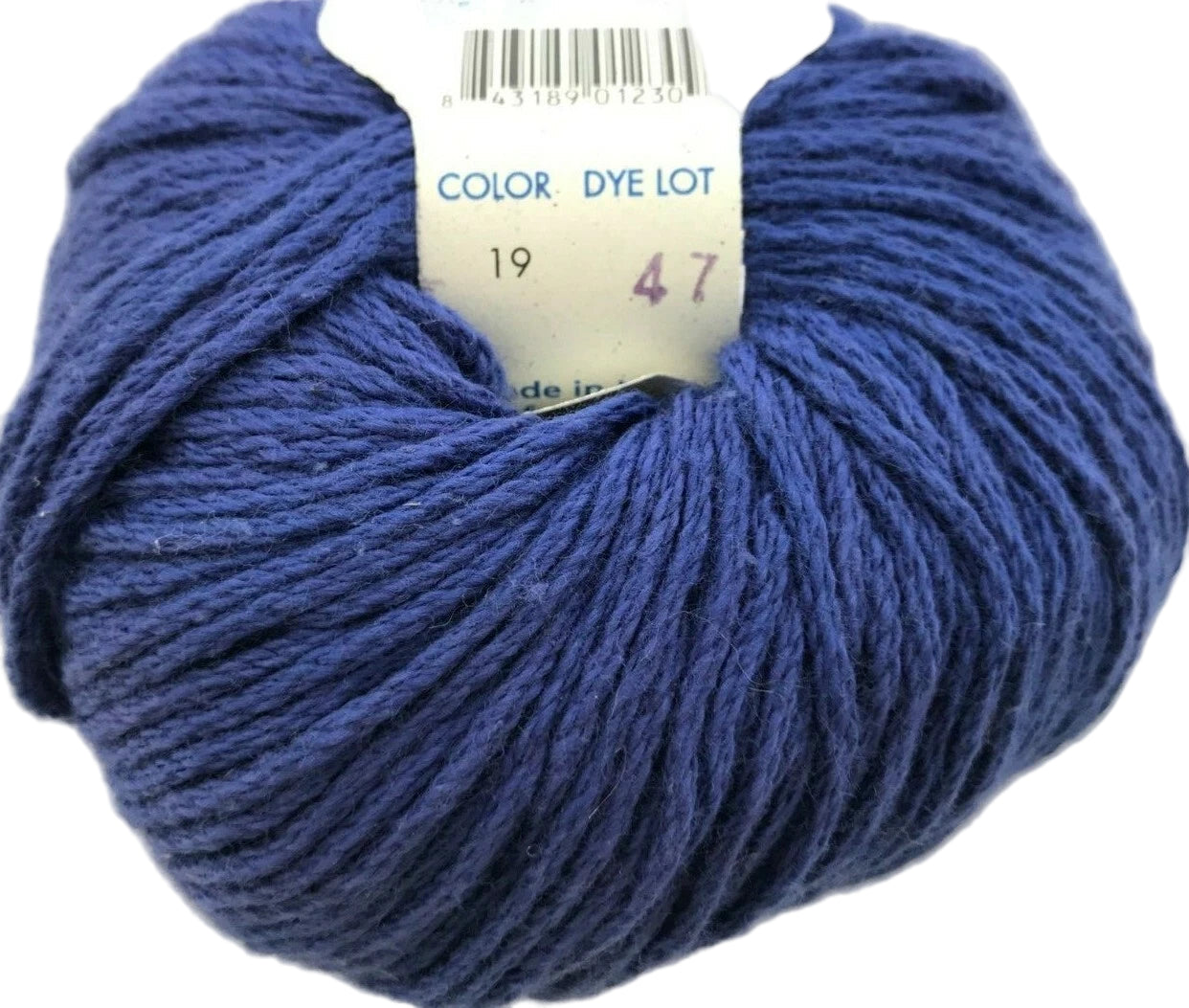 Blue yarn ball with a label on a white background