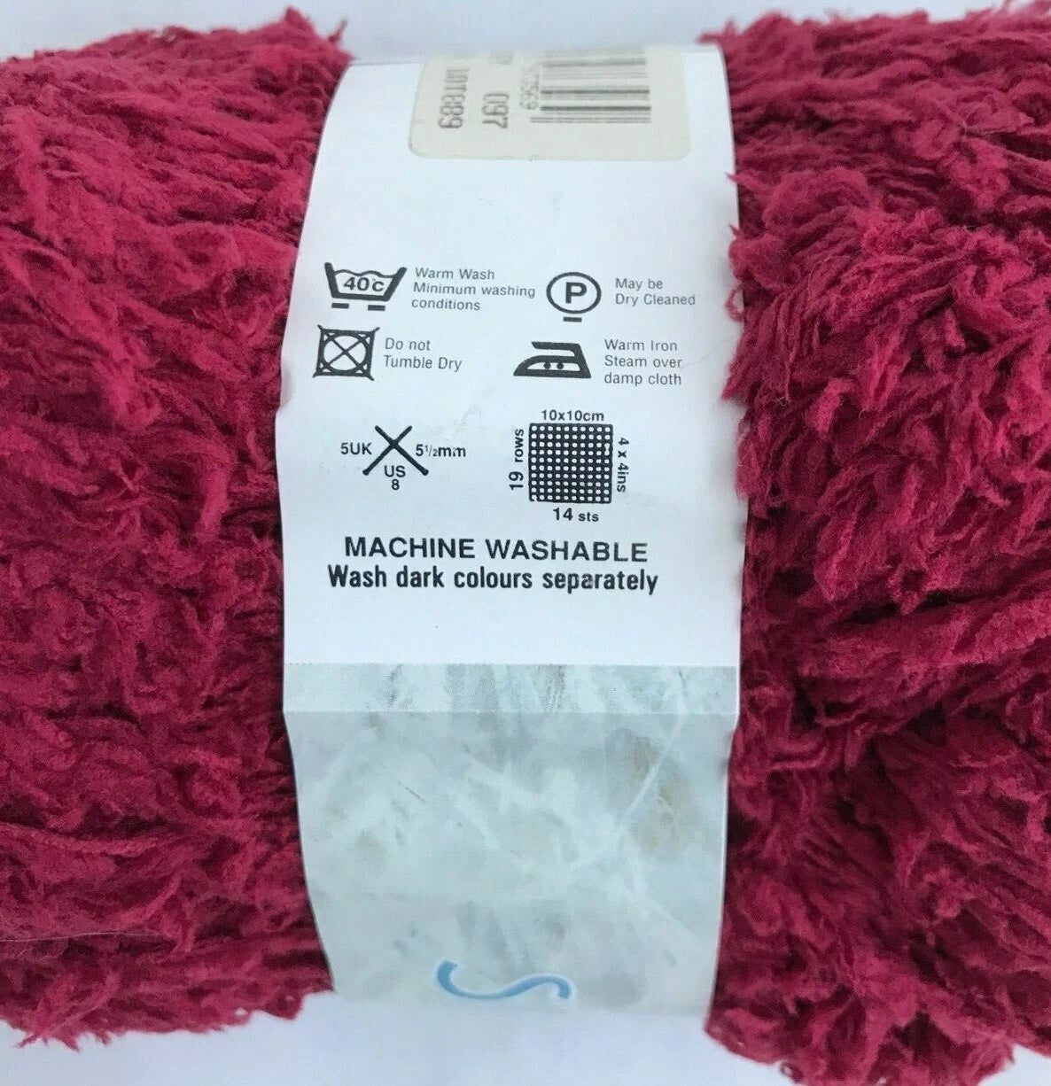 Red textured fabric with a label on a white background
