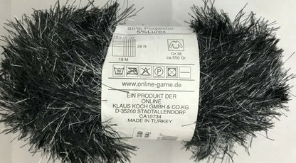 Black yarn skein with a label in the center on a white background