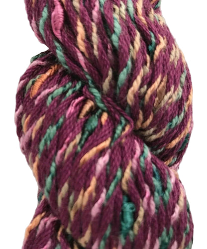Multicolored skein of yarn on a white background