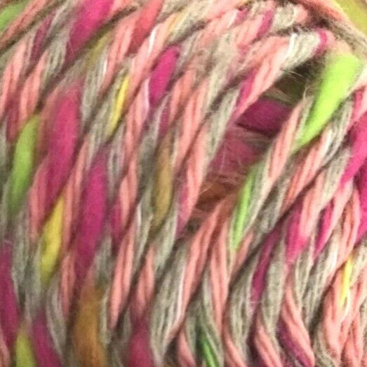 Close-up of multicolored yarn with pink, green, and brown tones.