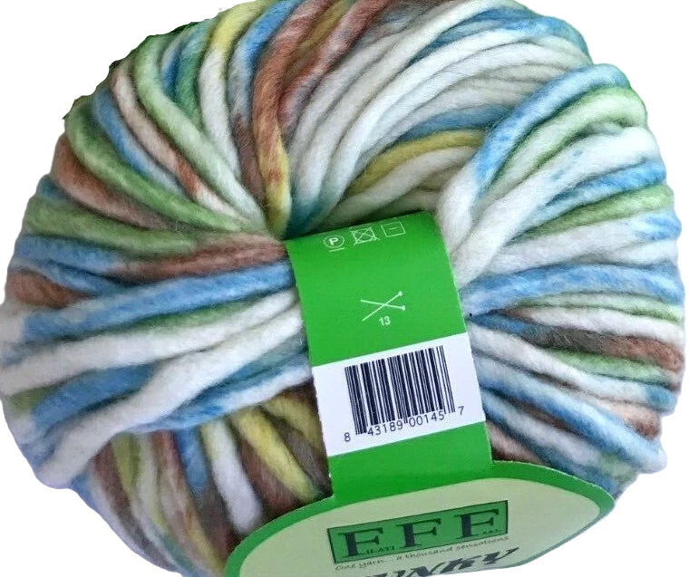 Multicolored yarn skein with a green label on a white background