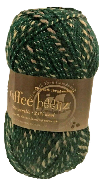 Green skein of yarn with a label on a white background