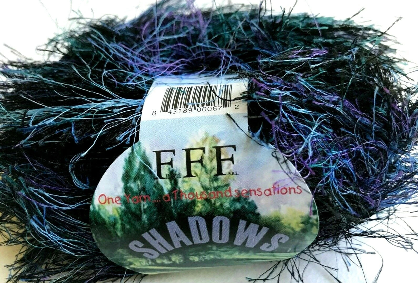 Yarn ball with a label on a white background
