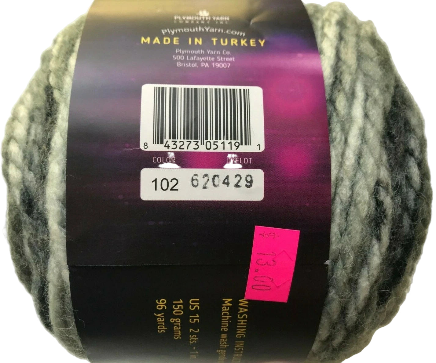 Ball of yarn with a label showing 'Made in Turkey' and product details.