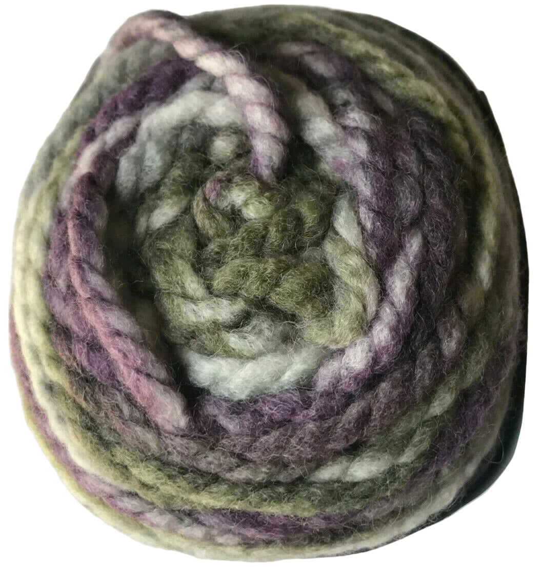 Ball of multicolored yarn on a white background