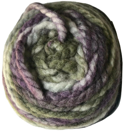 Ball of multicolored yarn on a white background