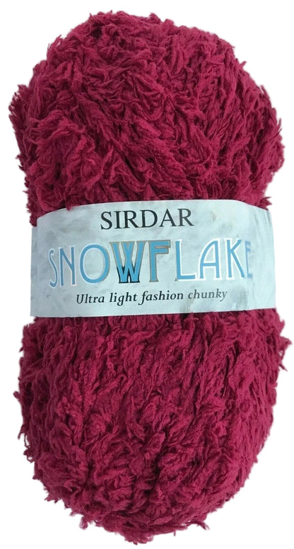 Red skein of yarn with a Sirdar Snowflake label on a white background