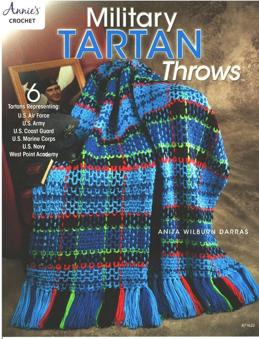 Crocheted military tartan throw with colorful pattern on a textured background