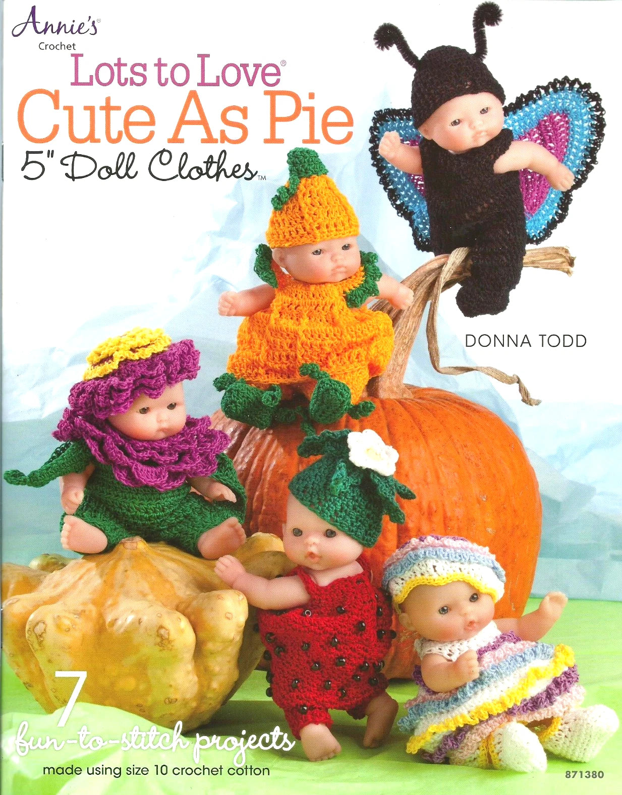 Book cover of 'Lots to Love: Cute as Pie' with dolls in crocheted outfits on pumpkins.