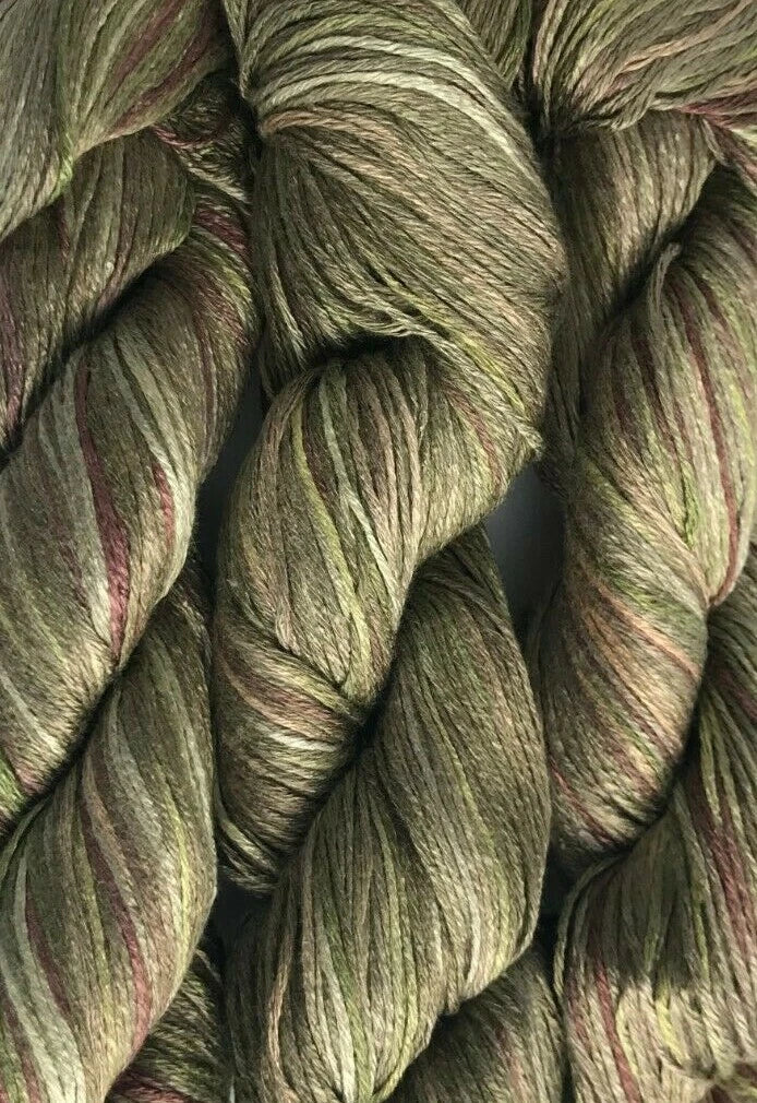 Close-up of green and brown yarn skeins
