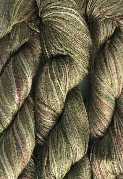 Close-up of green and brown yarn skeins