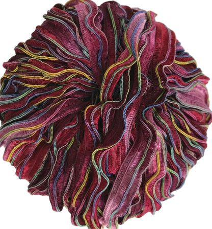 Multicolored textured fabric swatch on a white background