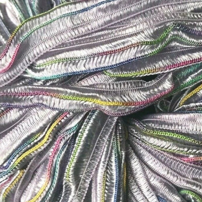 Multicolored yarn ball on a white background