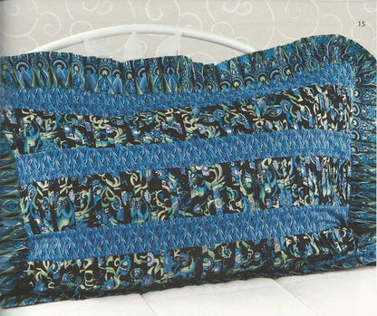 Blue and black patterned fabric on a white background
