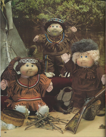 Three dolls in Native American attire with a rustic setting