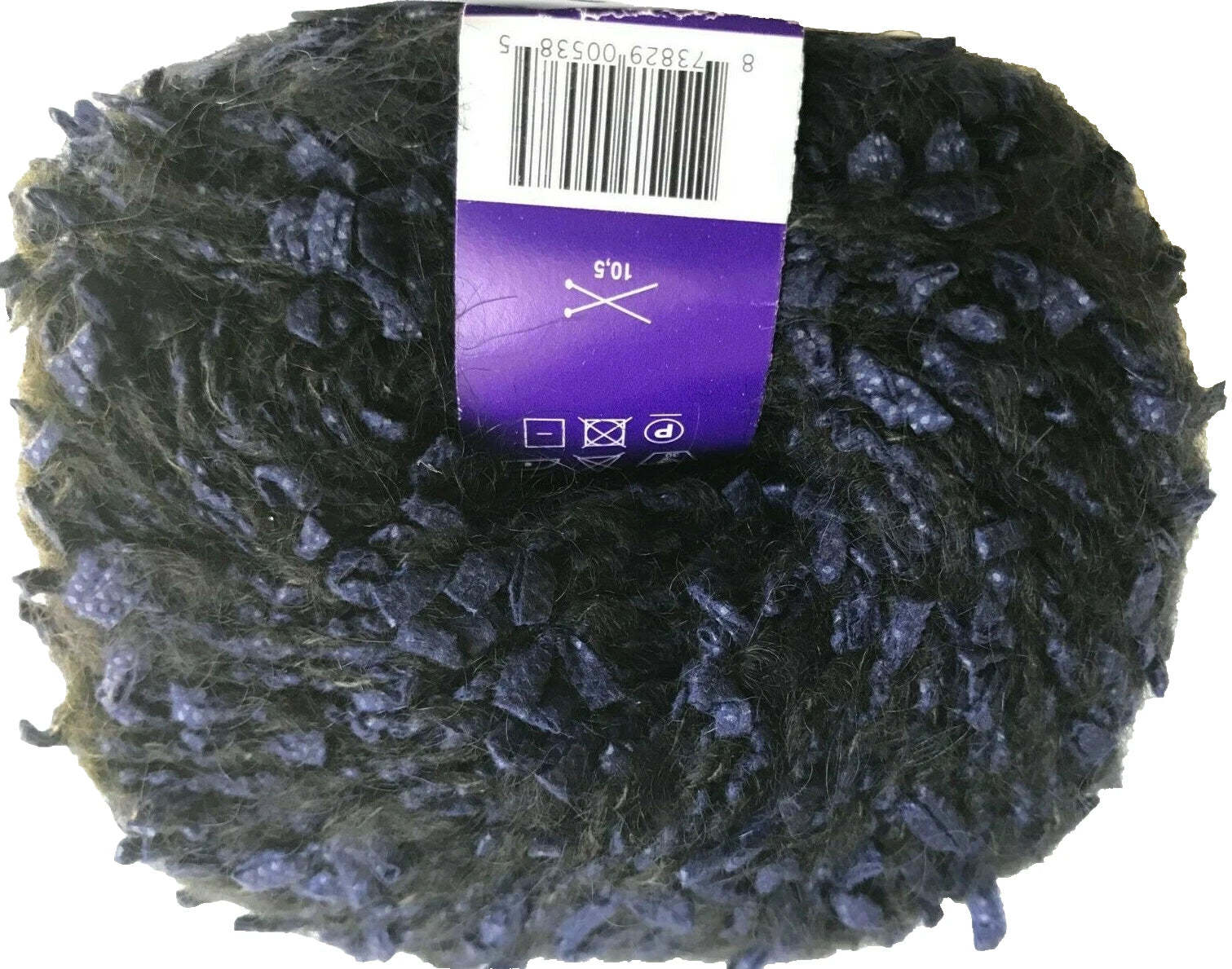Ball of dark yarn with a purple label on a white background