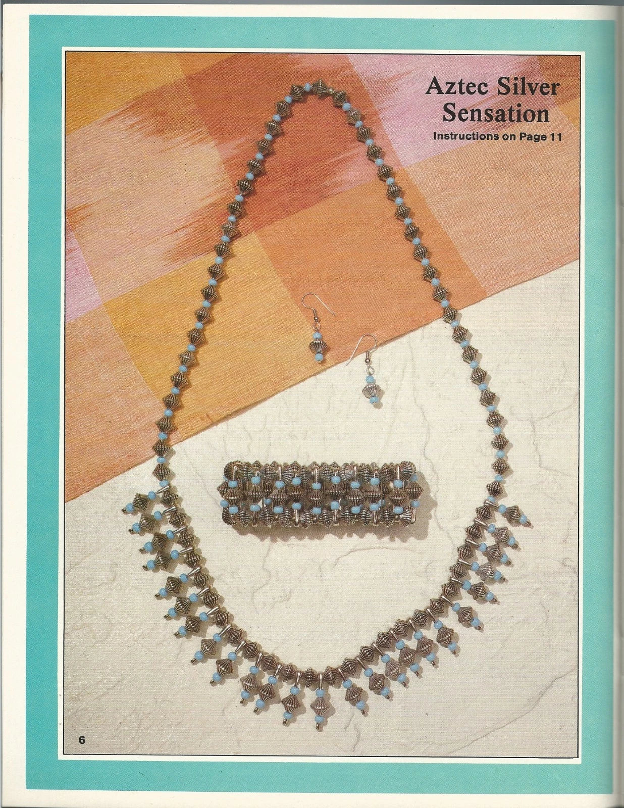 Jewelry set with necklace, bracelet, and earrings on a patterned background with text 'Aztec Silver Sensation'.
