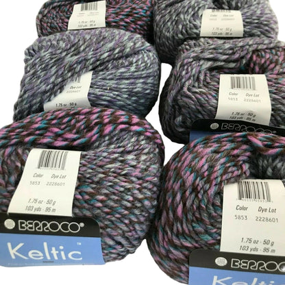 Multiple skeins of Berroco Keltic yarn with labels on a white background
