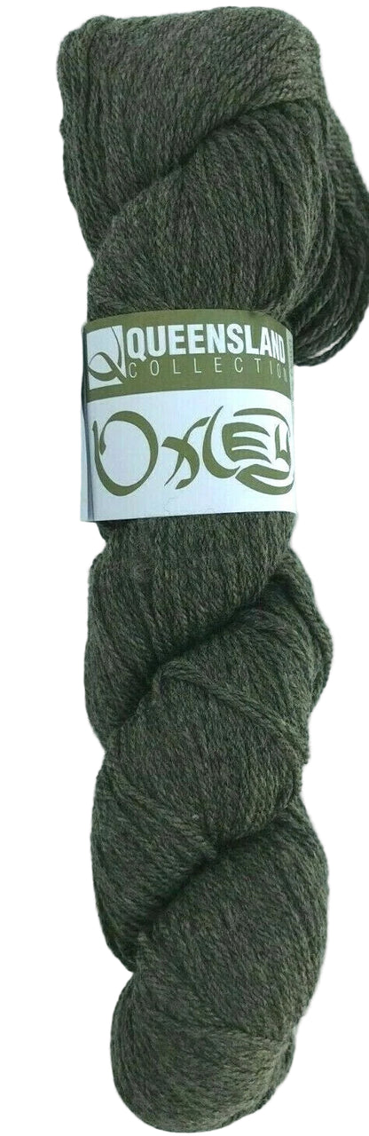Ball of green yarn with a label on a white background