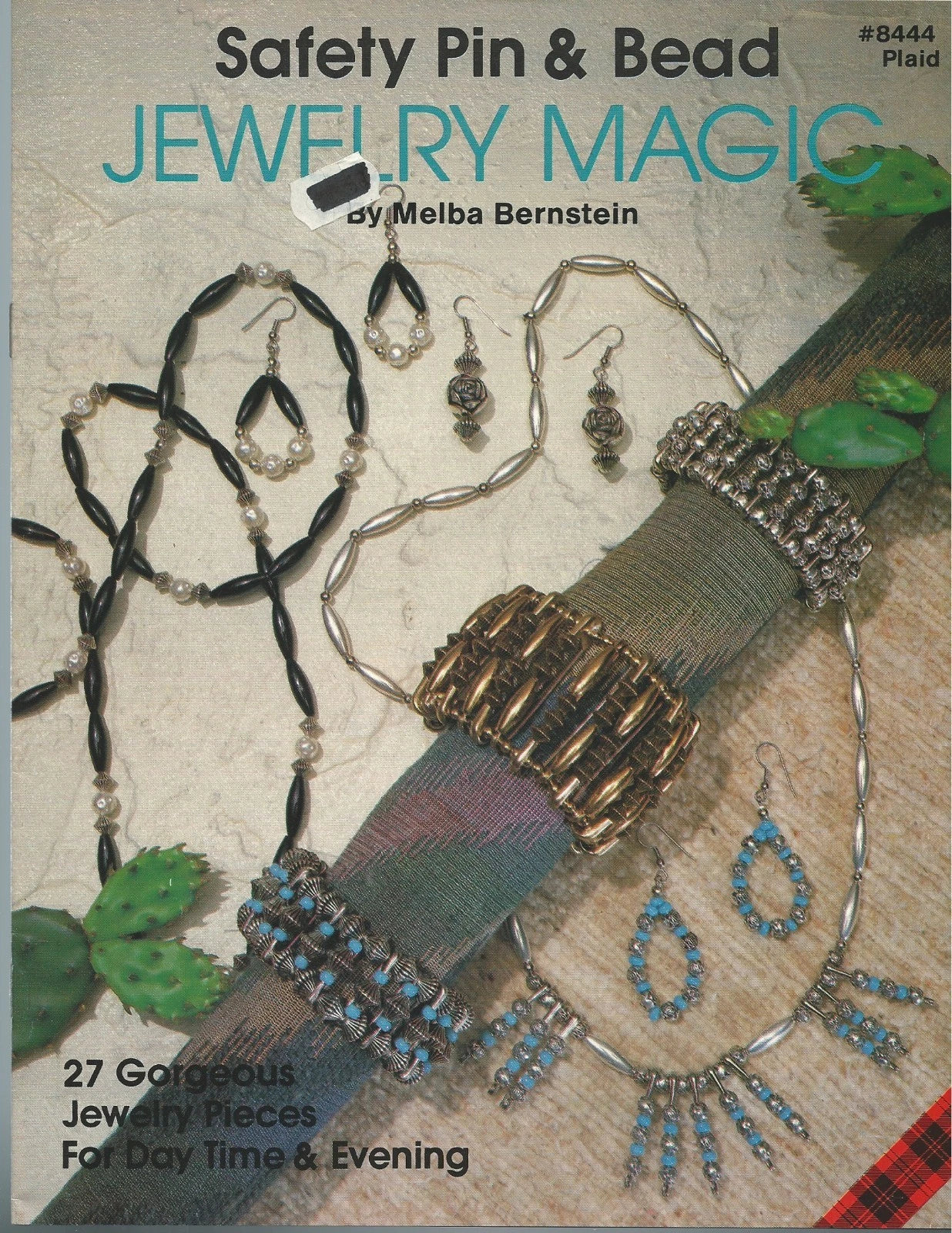 Book cover of 'Safety Pin & Bead Jewelry Magic' by Melba Bernstein with jewelry pieces displayed.