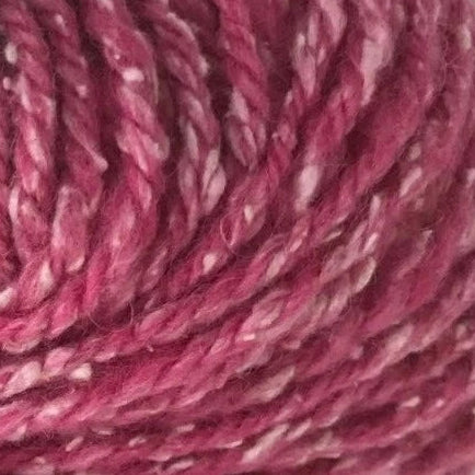 Close-up of pink yarn with speckles