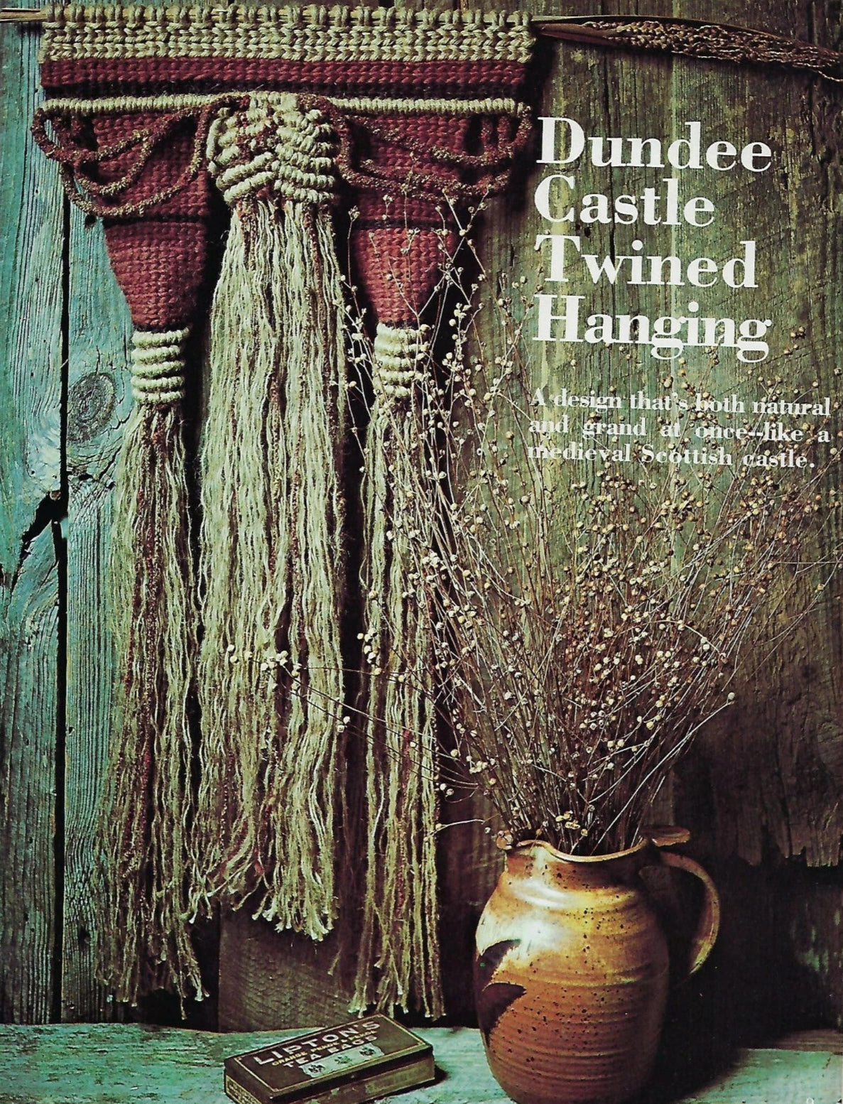Dundee Castle Twined Hanging with a rustic vase and book on a wooden surface.