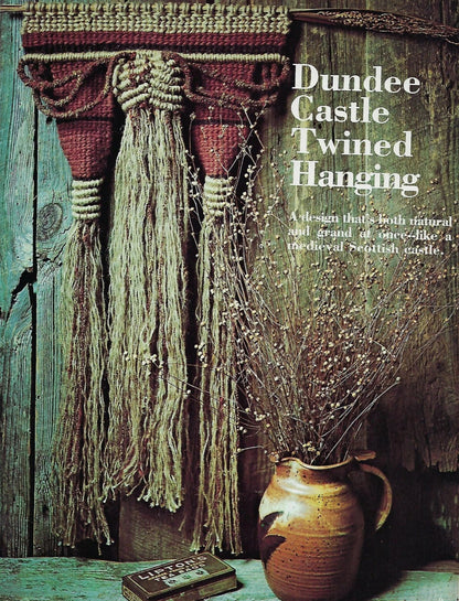 Dundee Castle Twined Hanging with a rustic vase and book on a wooden surface.