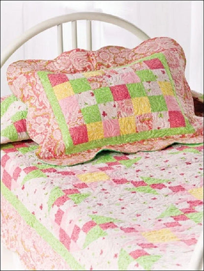Patchwork quilt with colorful patterns on a bed