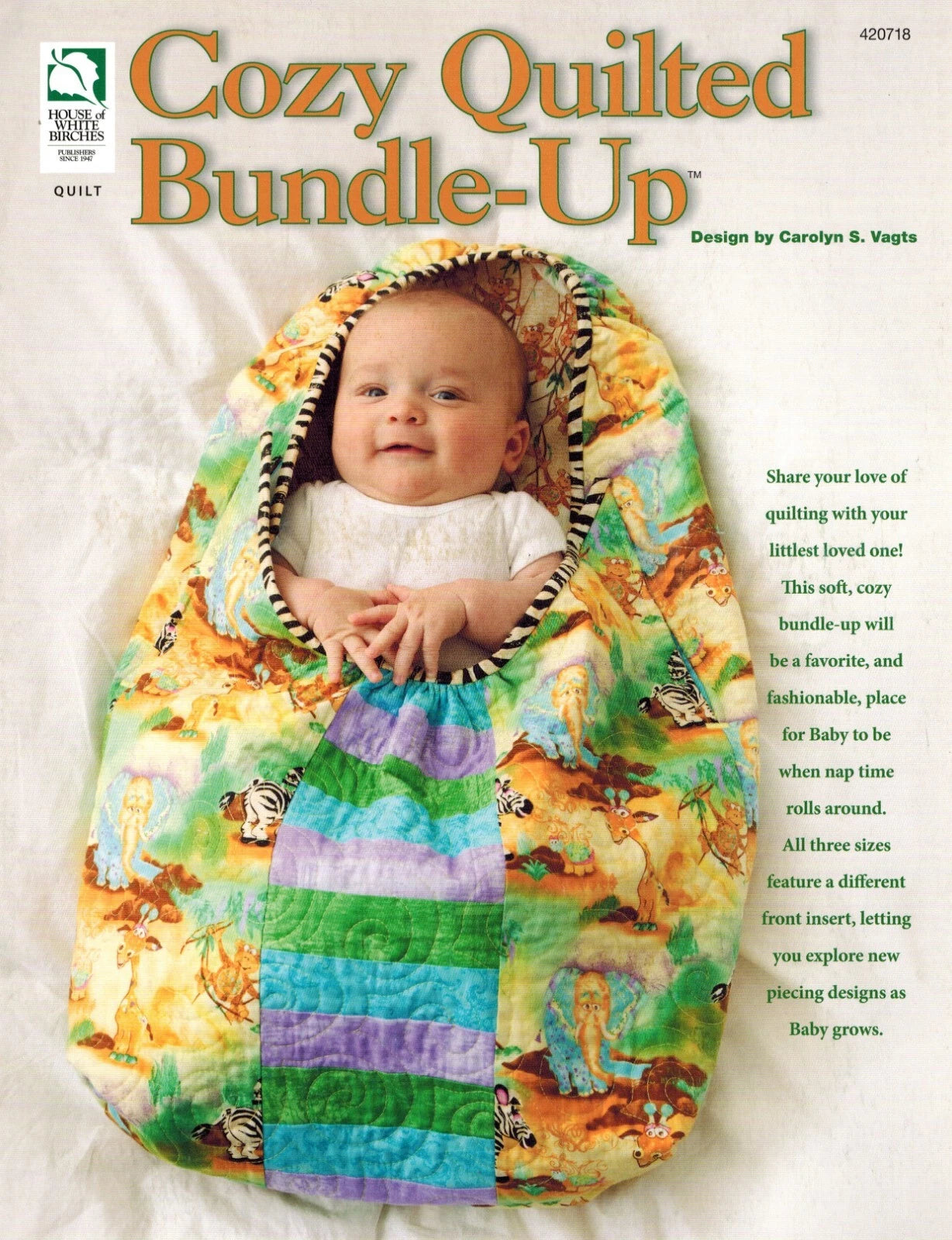 Baby quilted bundle-up with colorful design on a white background