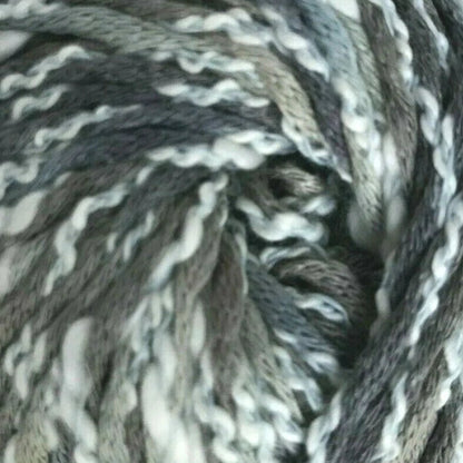 Ball of gray and white yarn on a white background