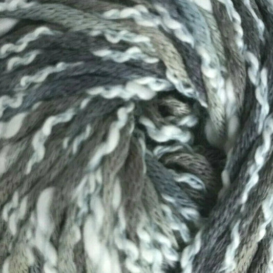 Ball of gray and white yarn on a white background