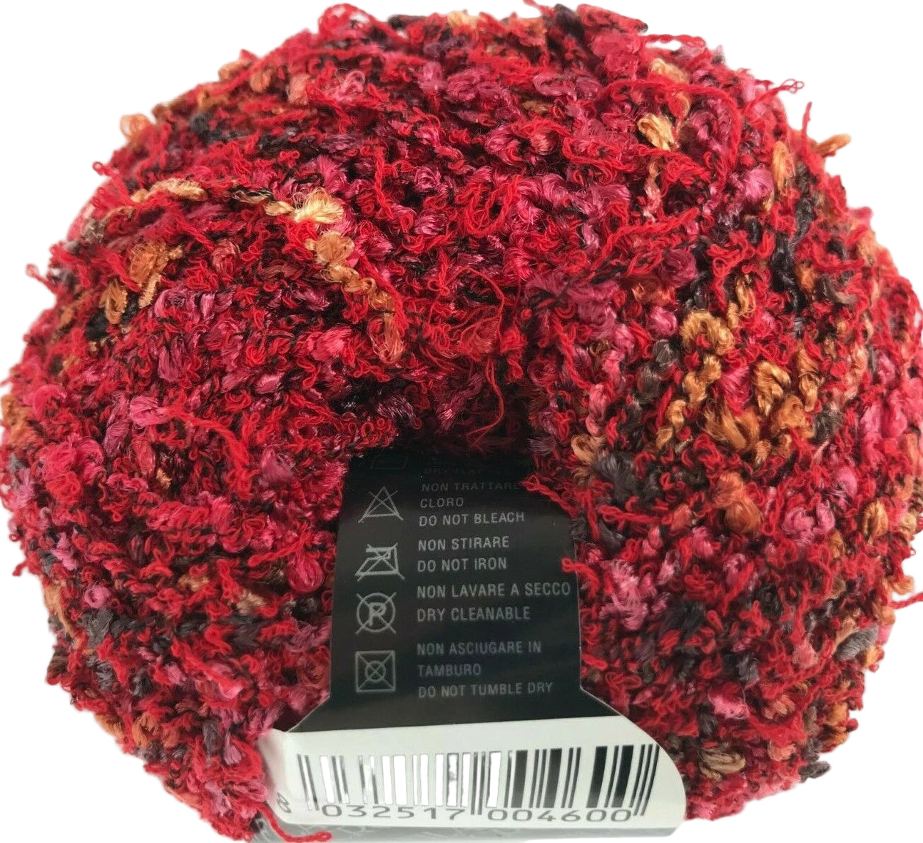 Red and brown textured yarn ball with a label on a white background