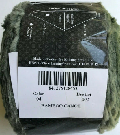 Ball of yarn with a label showing knitting instructions and product details.