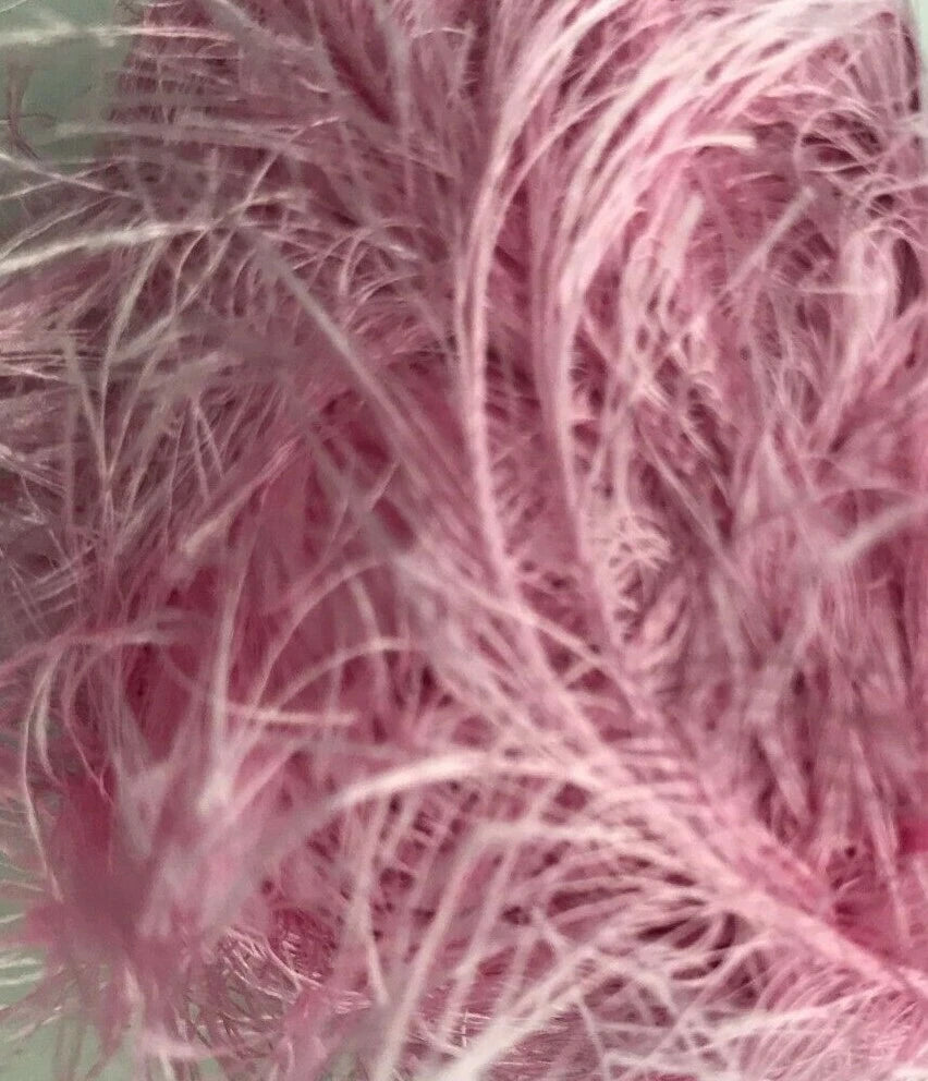 Close-up of pink decorative feathers with a blurred background
