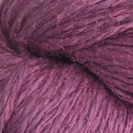Purple skein of yarn with a LinSilk label on a white background