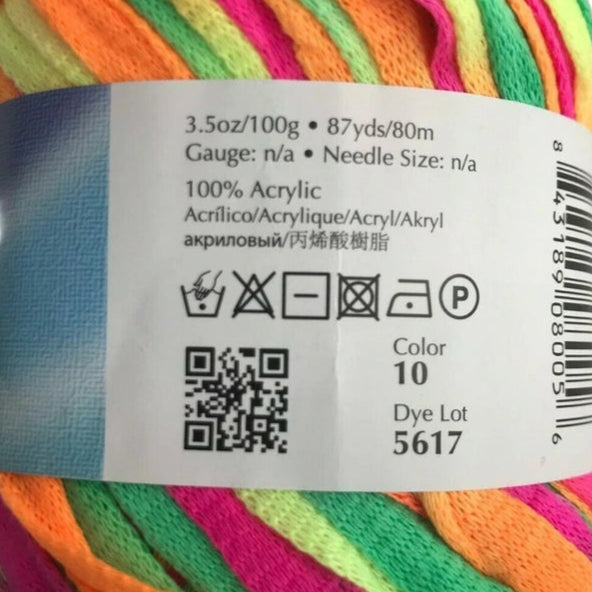 Colorful skein of yarn with a label on a white background