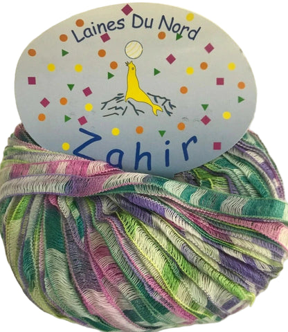 Multicolored yarn ball with 'Laines Du Nord' label on a white background