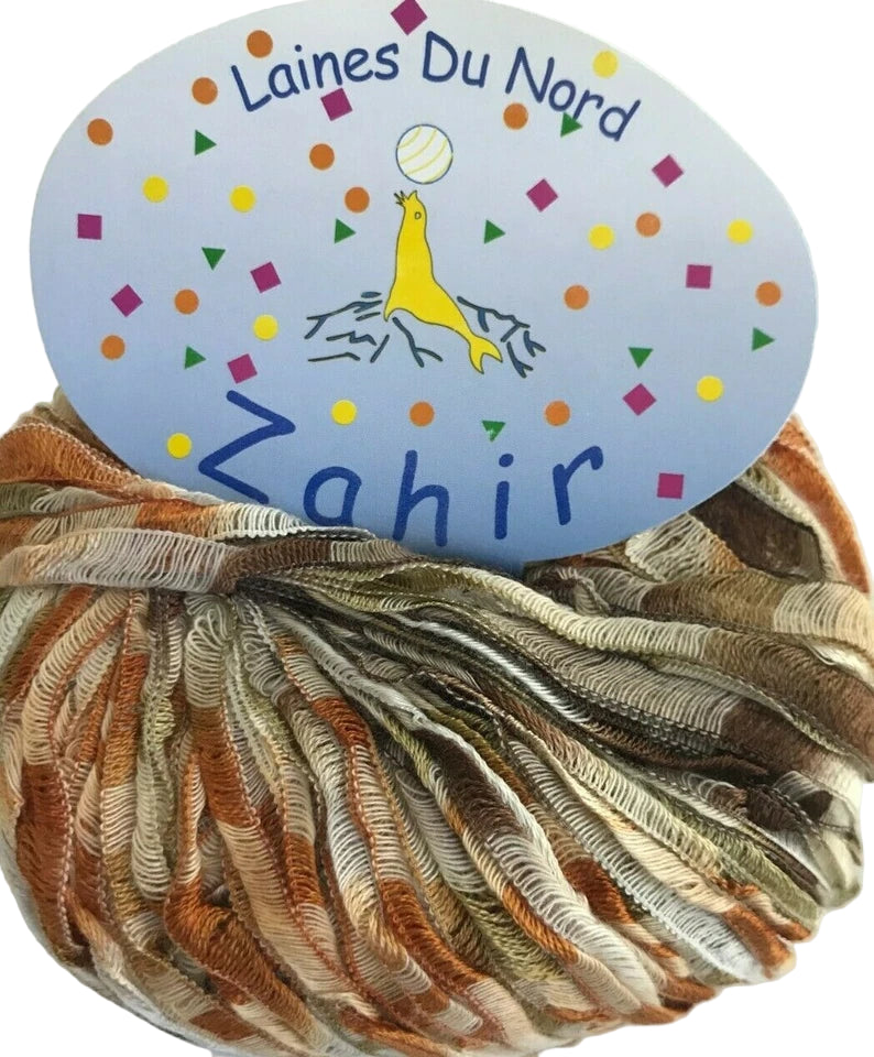 Ball of yarn with 'Laines Du Nord Zahir' label on a white background