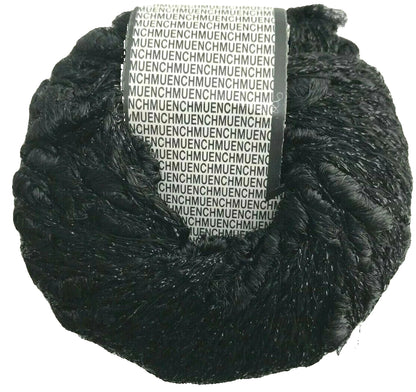 Black yarn ball with a label on a white background