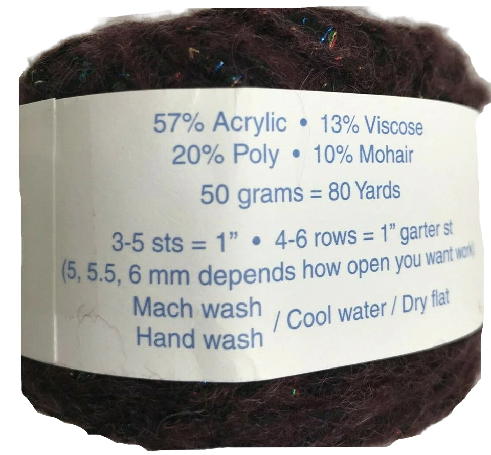 Yarn ball with label detailing composition and care instructions