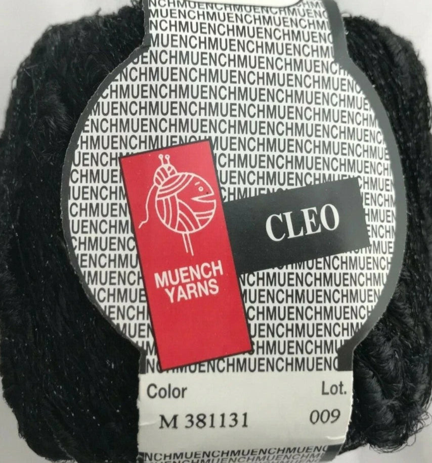 Black yarn ball with Muench Yarns and Cleo labels on a white background
