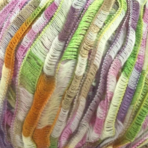 Multicolored skein of yarn on a white background
