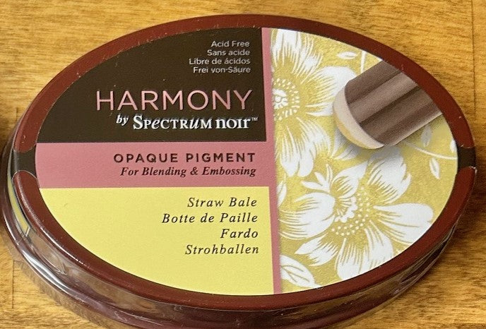  Spectrum Noir Harmony Opaque Pigment Inkpad in the color "Straw Bale", which is acid-free, archival, and designed for blending and embossing. It has a rich, slow-drying consistency. 