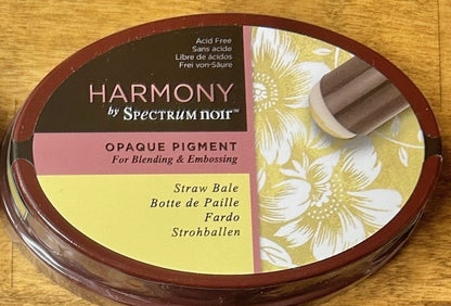  Spectrum Noir Harmony Opaque Pigment Inkpad in the color "Straw Bale", which is acid-free, archival, and designed for blending and embossing. It has a rich, slow-drying consistency. 